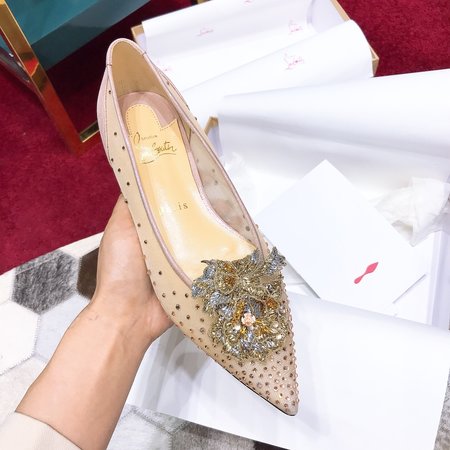 Christian Louboutine Pumps with red soles