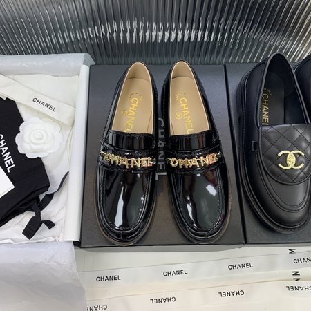 Chanel Patent leather loafers with metallic letters