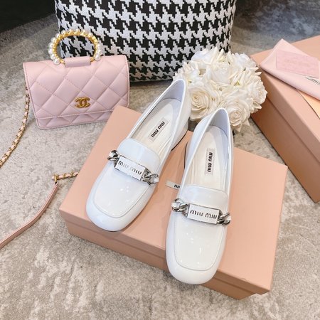 Miu Miu reflective loafers