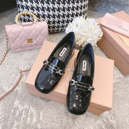 Miu Miu reflective loafers