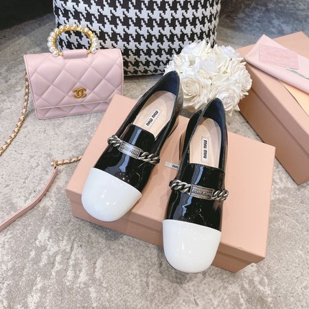 Miu Miu reflective loafers