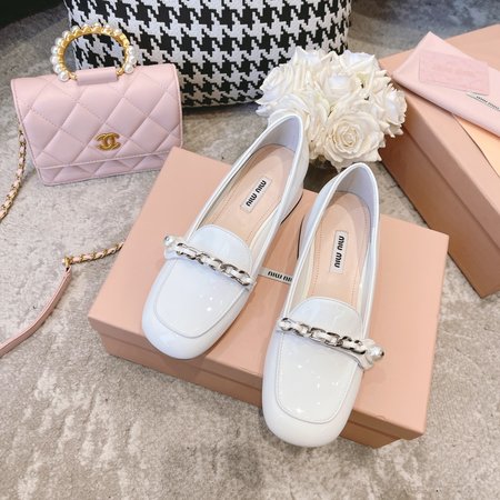 Miu Miu reflective loafers