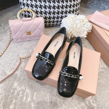 Miu Miu reflective loafers