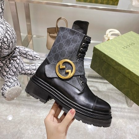 Gucci Embroidered patchwork cowhide boots
