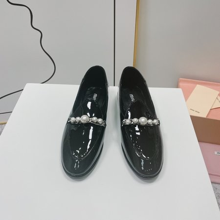 Miu Miu patent leather loafers