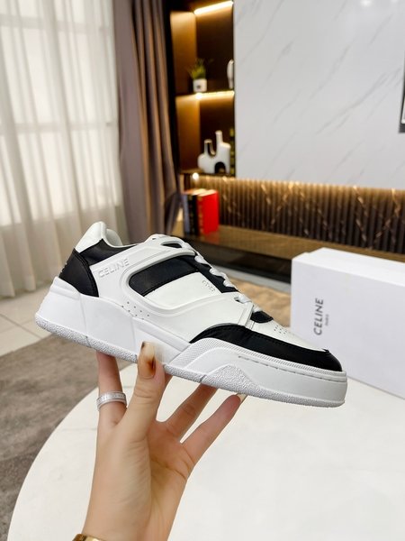 Celine Panda color couple sports white shoes