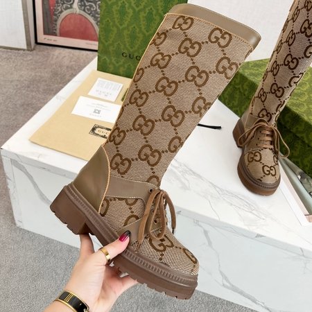 Gucci Embroidered patchwork cowhide boots