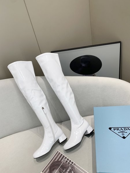 Prada Patent leather boots with sheepskin lining