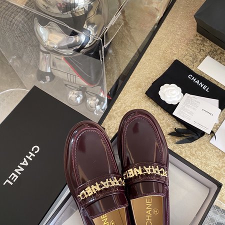 Chanel Metal Logo Loafers