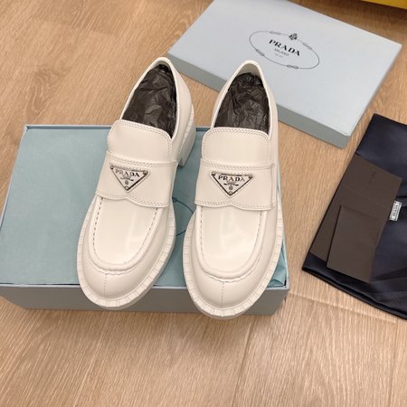 Prada Triangular buckle platform loafers