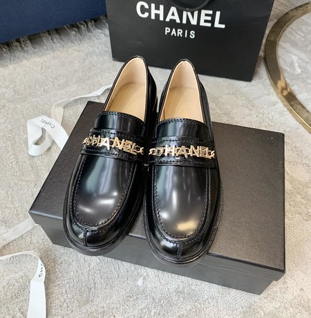 Chanel metal letter loafers