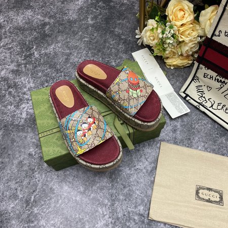 Gucci Embroidered printed platform slippers