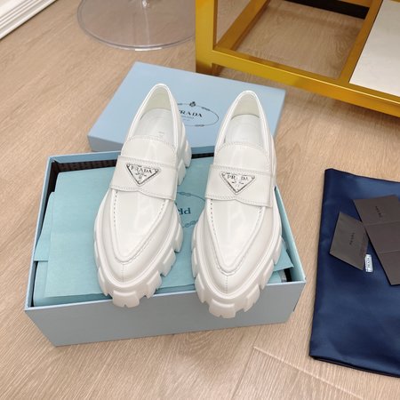 Prada Triangular buckle platform loafers