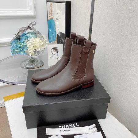 Chanel Camellia metal logo Chelsea booties elasticated design