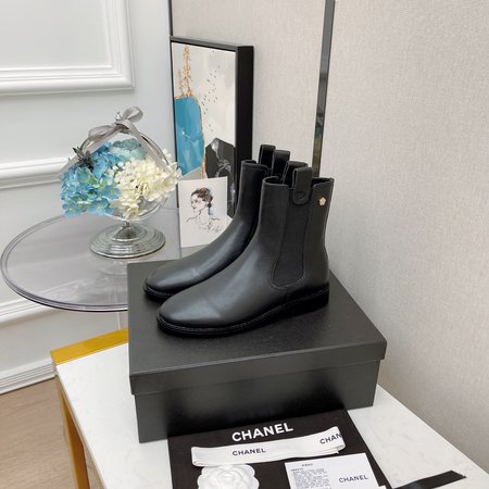 Chanel Camellia metal logo Chelsea booties elasticated design