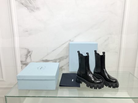 Prada Monolith patent leather pointed toe mid boots