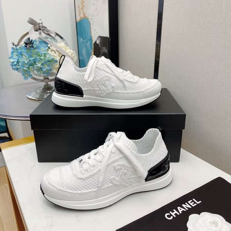 Chanel CC Panda knitted sneakers