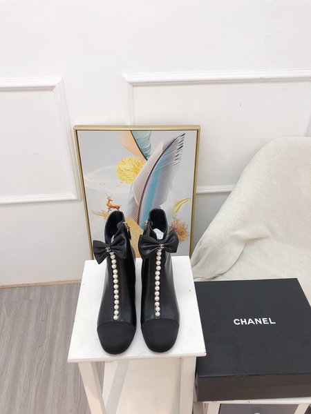 Chanel Pearl bow high-heeled ankle boots cowhide