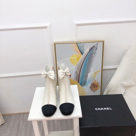 Chanel Pearl bow high-heeled ankle boots cowhide