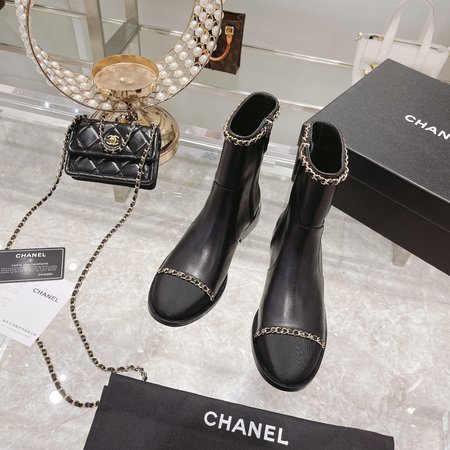 Chanel Chain thick heel boots in sheepskin