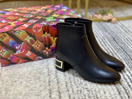 Louis Vuitton Booties heel logo