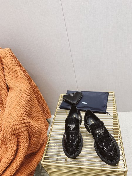 Prada triangle logo loafers