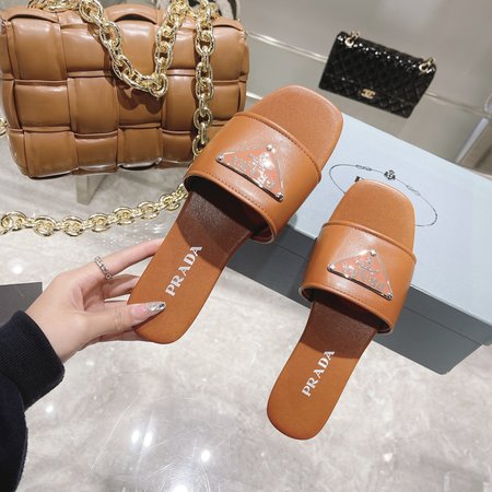 Prada Sheepskin Triangle Slippers