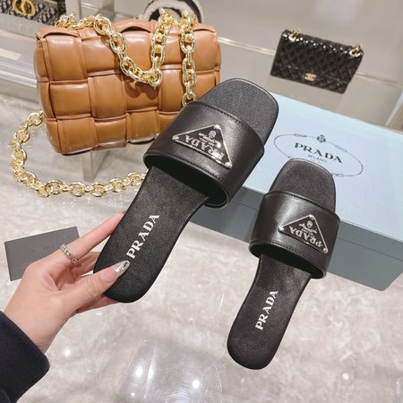 Prada Sheepskin Triangle Slippers