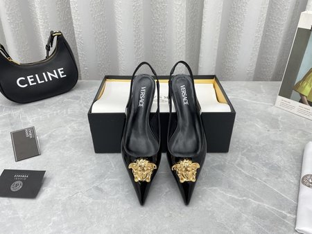 Versace women s flat back shoes