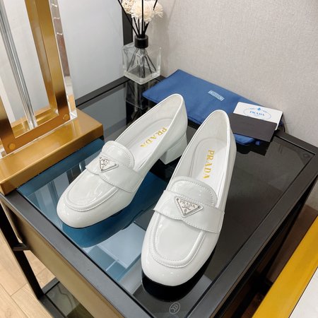 Prada Patent leather mid-heel loafers with triangle logo design