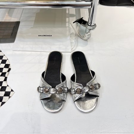 Balenciaga Metal slipper silhouette hardware