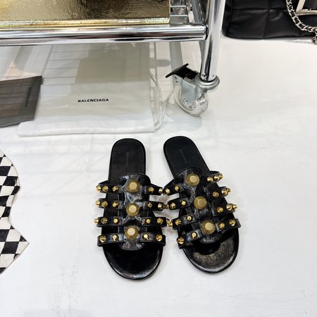 Balenciaga Metal slipper silhouette hardware