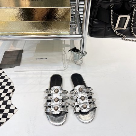 Balenciaga Metal slipper silhouette hardware