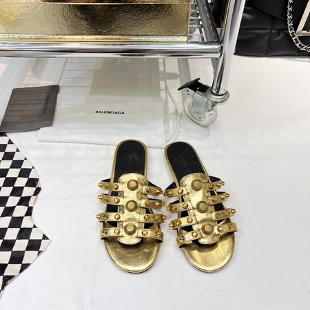 Balenciaga Metal slipper silhouette hardware