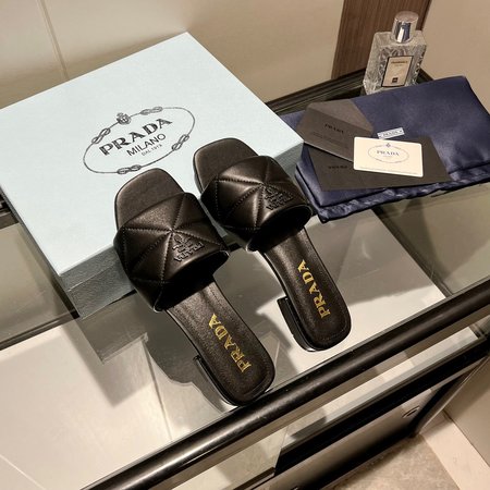 Prada sheepskin slippers