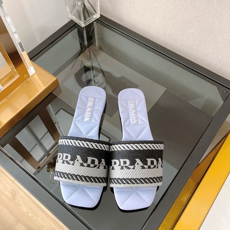 Prada embroidered slip-on sandals