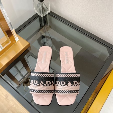 Prada embroidered slip-on sandals