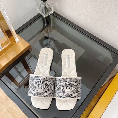 Prada embroidered slip-on sandals