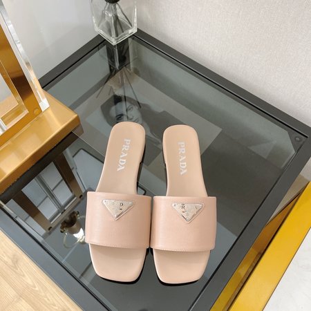 Prada triangle logo flat slippers