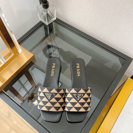 Prada triangle logo flat slippers