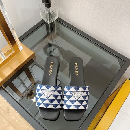 Prada triangle logo flat slippers