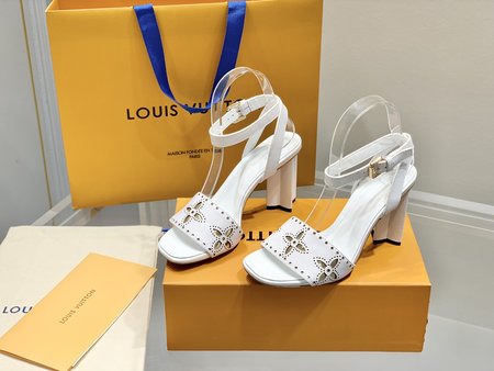 Louis Vuitton laser engraved leather pumps