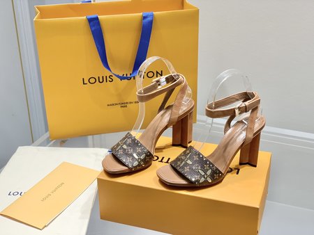 Louis Vuitton laser engraved leather pumps