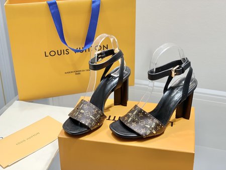 Louis Vuitton laser engraved leather pumps