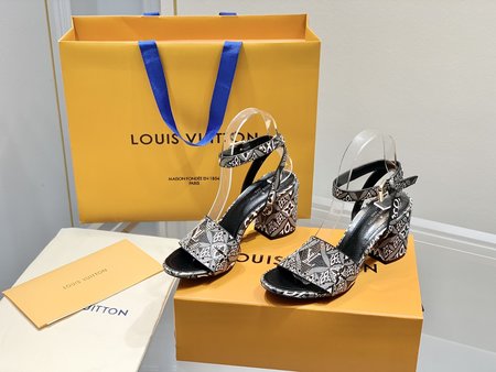 Louis Vuitton laser engraved leather pumps