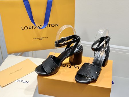 Louis Vuitton laser engraved leather pumps