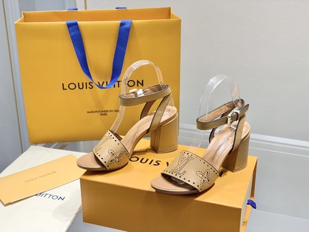 Louis Vuitton laser engraved leather pumps