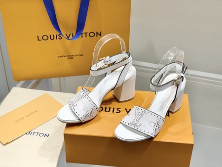 Louis Vuitton laser engraved leather pumps