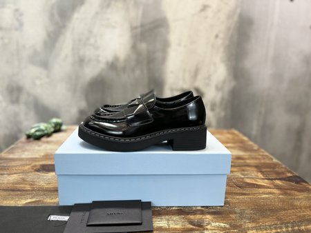 Prada small leather loafers