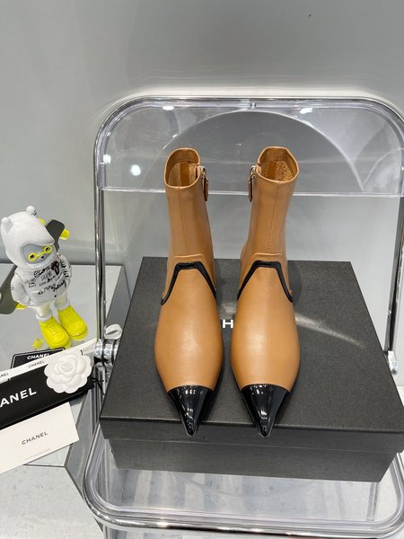 Chanel pointed toe high heel boots